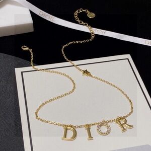 Dior gold letter necklace with crystal "O" pendant - iconic design